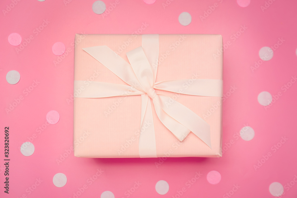Beautiful gift box on color background