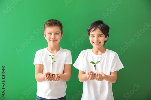 Little children with plants...