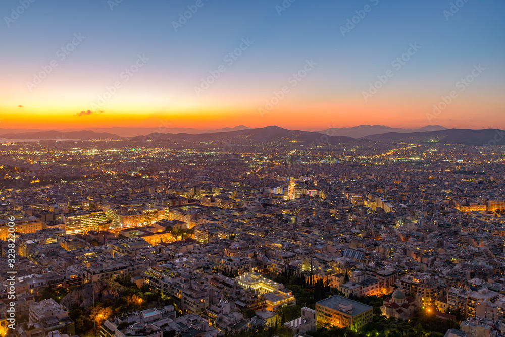 Fototapeta premium Panoramic view of Athens city from Lykavittos Hill at sunset time