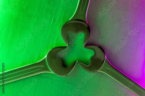 Concept with wrenches on the theme of clover St. Patrick's Day. photo