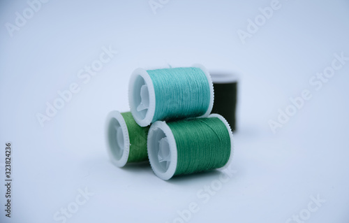 Roll of thread put on white background,show texture,for needle work