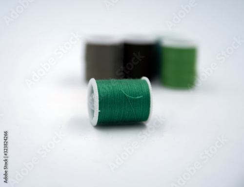 Roll of thread put on white background,show texture,for needle work