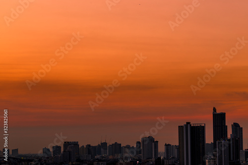 The abstract background of the evening sky and the surrounding buildings, showing the distribution of housing in the capital