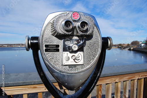 Coin-operated binoculars along the Robert Correia Boardwalk at Heritage State Park and Battleship Cove, Fall River Massachusetts January 2020. photo
