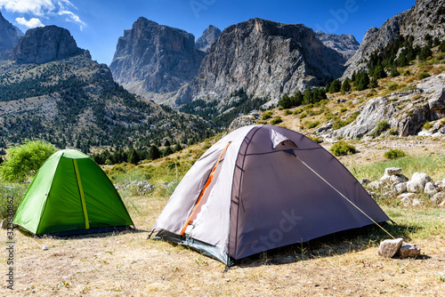 Mountain landscape with trees and two tents in the Turkish national Park aladag in summer day