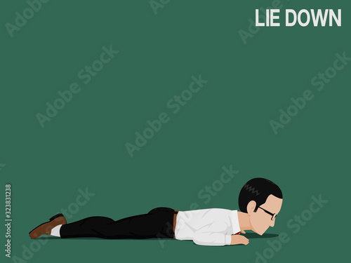 A business man is laying down on the ground
