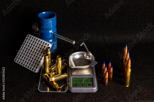 Modern Reloading cartridges to recycle ammunition using brass casing and bullets for gun or rifle