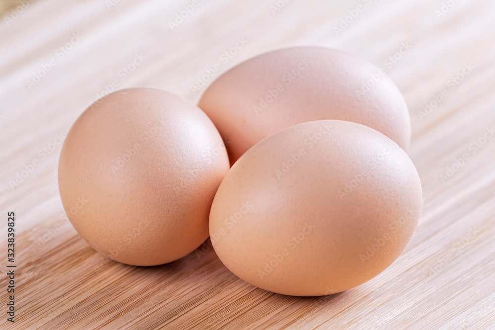 A background of farm fresh brown eggs A background of farm fresh brown eggs