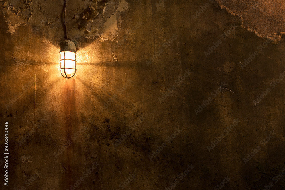Worn grunge wall with light. Architecture abstract background