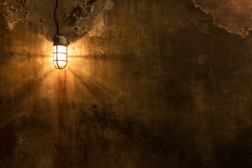 Worn grunge wall with light. Architecture abstract background