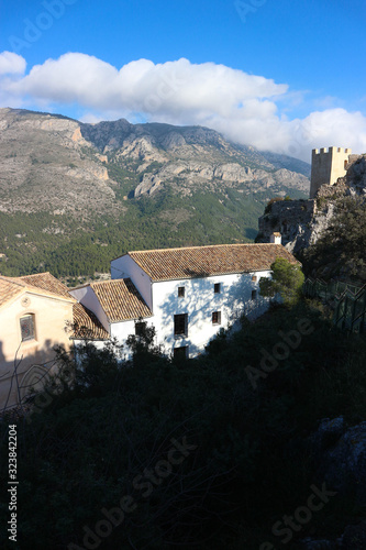 view to cosy small spanish village Castell de Guadalest with the castle on the rock, Spain