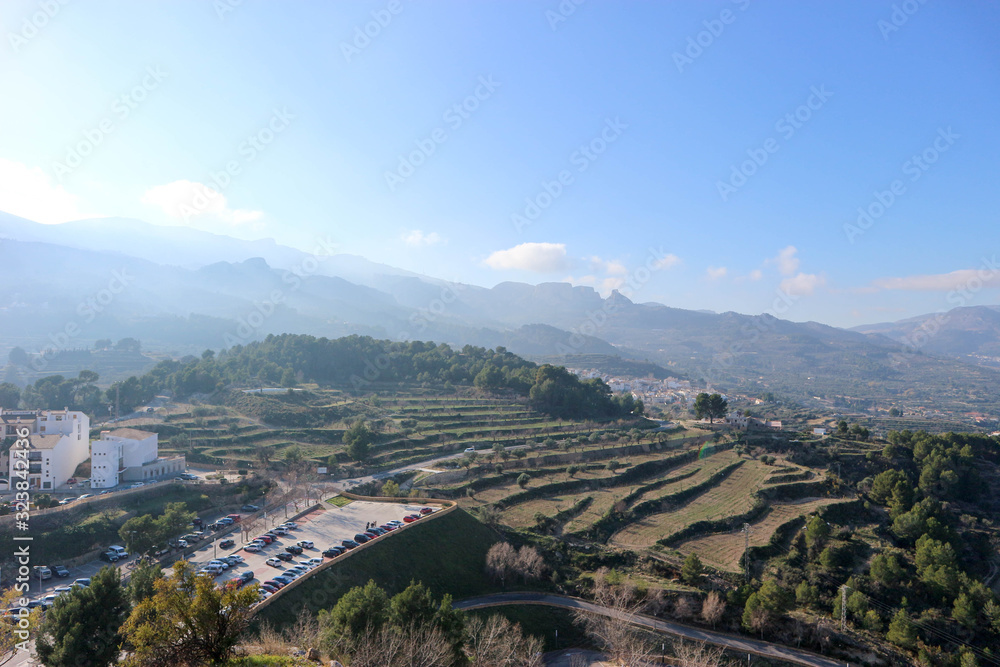 aerial view from the castle to the beautiful landscape with terraces in Castell de Guadalest, Spain