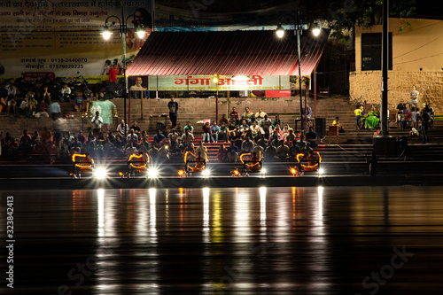Evening aarti is being performed on Triveni Ghaat, Ganges River, Rishikesh, Dehradun, Uttarakhand India. 