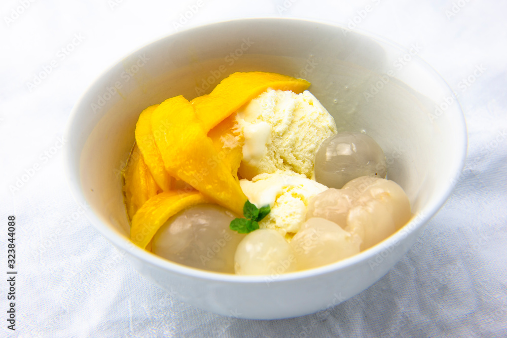 Garnished lychee and vanilla ice cream Garnished lychee and vanilla ice cream