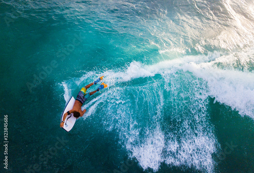 Surfer rides the ocean wave