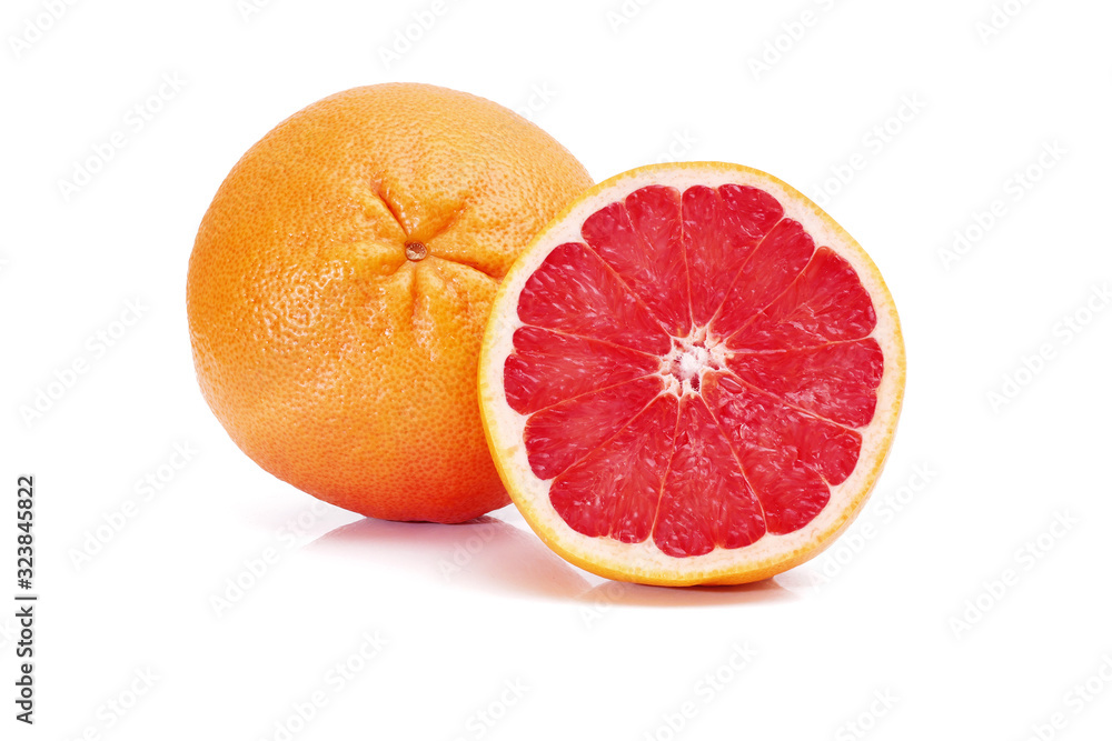 ripe grapefruit and half isolated on white background ripe grapefruit and half isolated on white background
