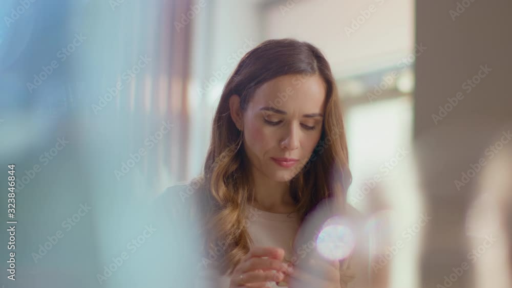 Woman browsing internet on smartphone. Girl checking messenger on mobile phone Woman browsing internet on smartphone. Girl checking messenger on mobile phone