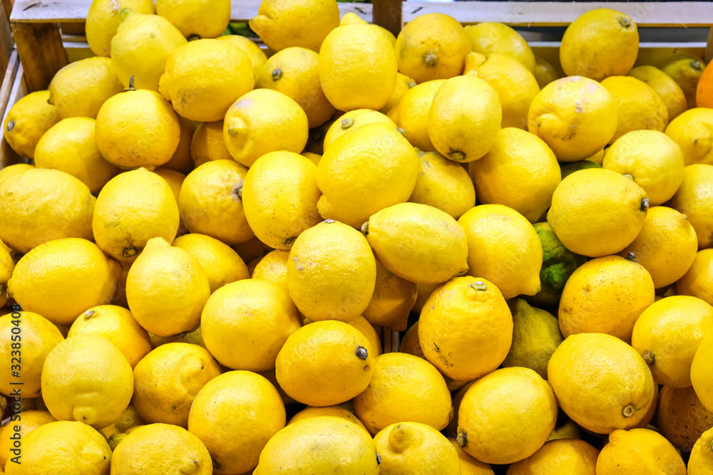 Pile of lemons for sale at a market
