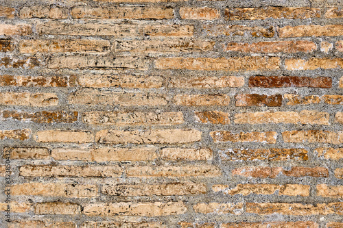 Background from a rough historic brick wall