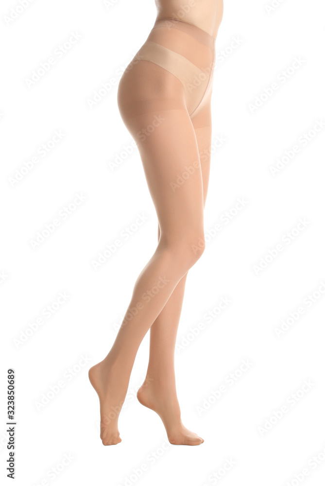 Woman wearing tights isolated on white, closeup of legs Woman wearing tights isolated on white, closeup of legs