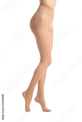 Woman wearing tights isolated on white, closeup of legs