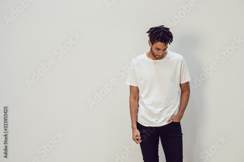 Canvas Print African american man wearing white blank t-shirt. Mock-up.