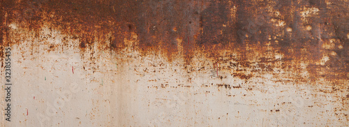 Peeling paint on the rust wall. Empty for design, pattern, cover, overlay texture, background and other, Surface of old steel background. photo