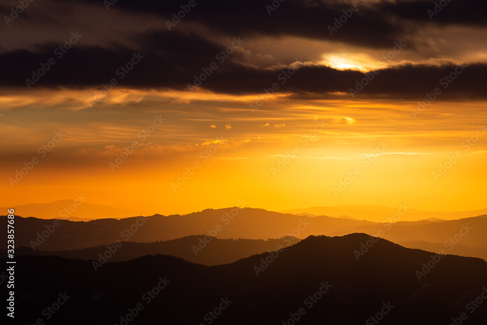 Sunset over mountains and valley