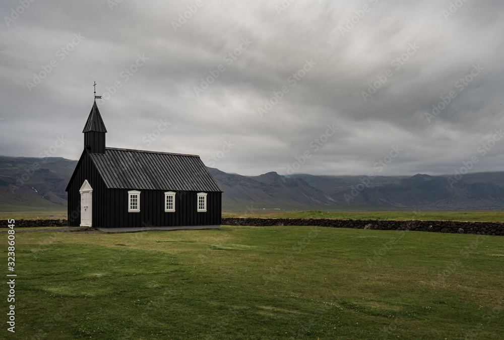 Famous black church in Budir, Iceland on a cloudy day