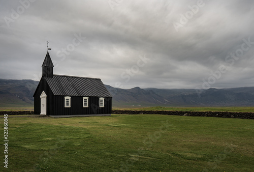 Famous black church in Budir, Iceland on a cloudy day