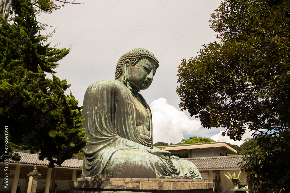 Side photograph of the great buddha of kamakura Side photograph of the great buddha of kamakura