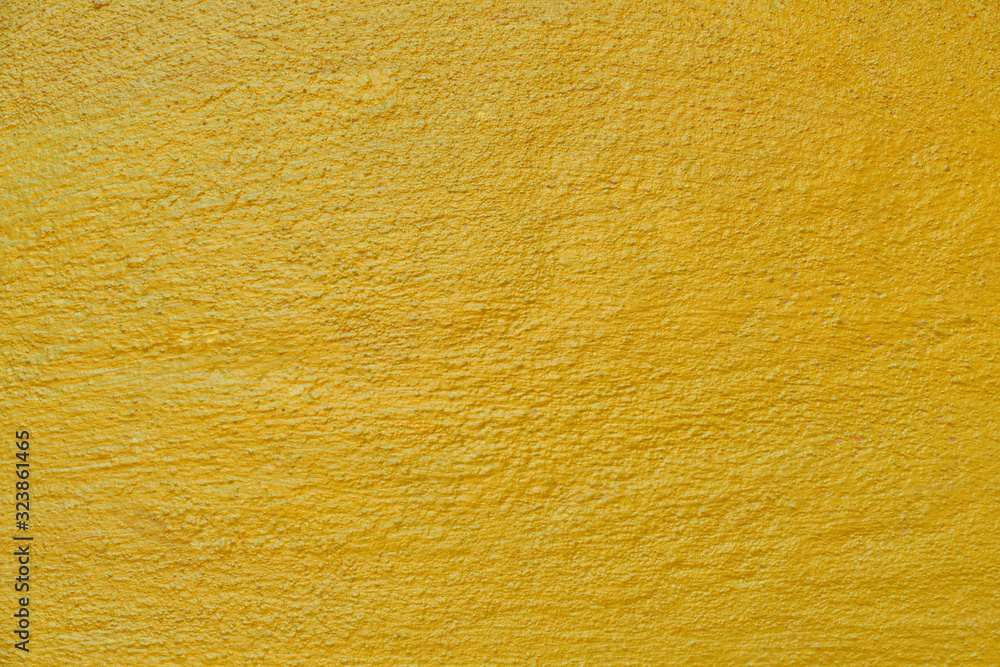 Gold background surface of cement gold color blank for design Gold background surface of cement gold color blank for design