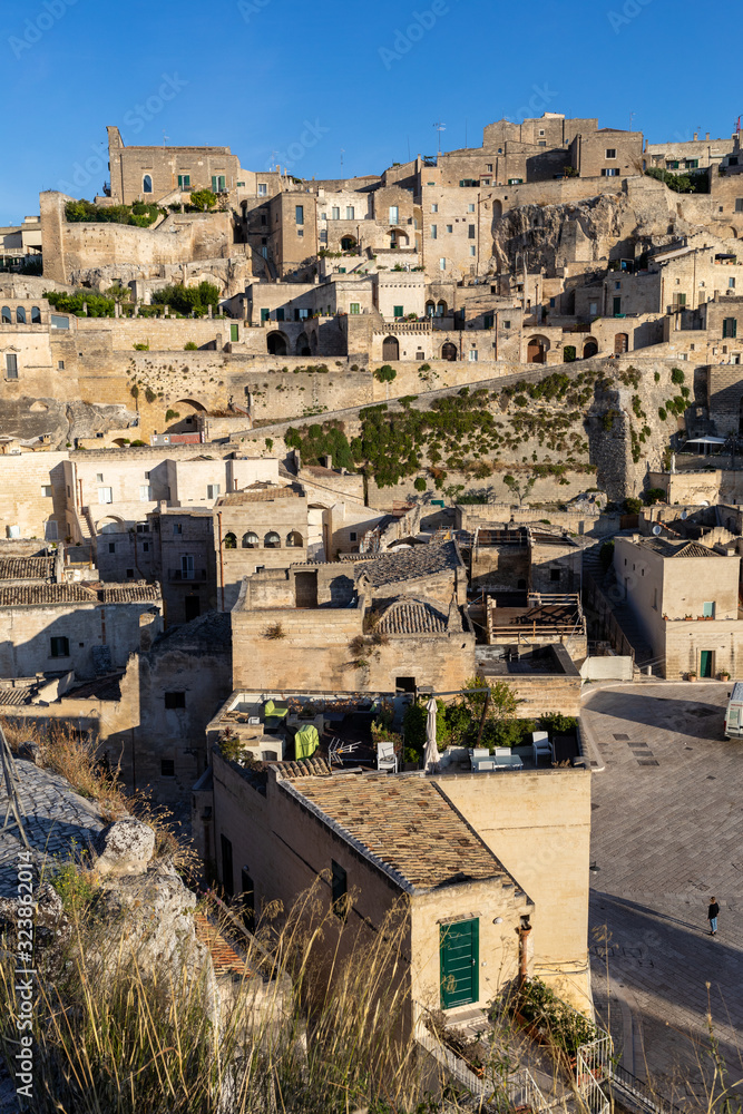 View of the Sassi di Matera a historic district in the city of Matera, well-known for their ancient cave dwellings. Basilicata. Italy
