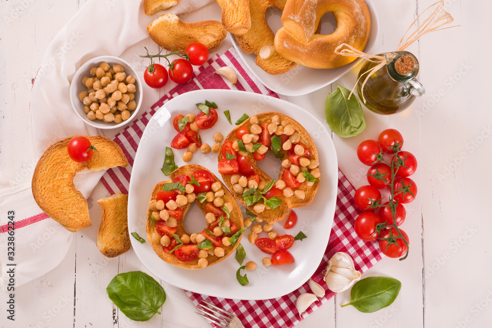 Friselle with tomatoes and chickpeas. Friselle with tomatoes and chickpeas.
