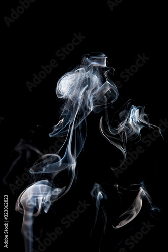 Clouds of smoke on black background