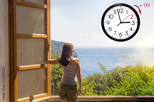 Daylight Saving Time. DST. Wall Clock going to winter time. Turn time forward.