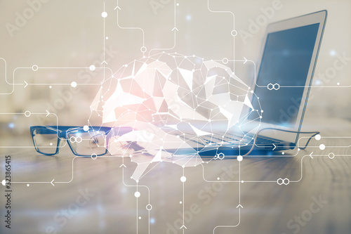 Multi exposure of work table with computer and brain hologram. Brainstorm concept.