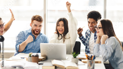 Yeah  Overjoyed students celebrating successful final tests