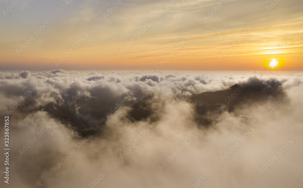 Snowdonia sunrise above the clouds in Wales UK Snowdonia sunrise above the clouds in Wales UK