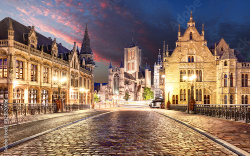 Gent, Belgium with Saint Nicholas Church and Belfort tower at twilight illuminated moment in Flanders.