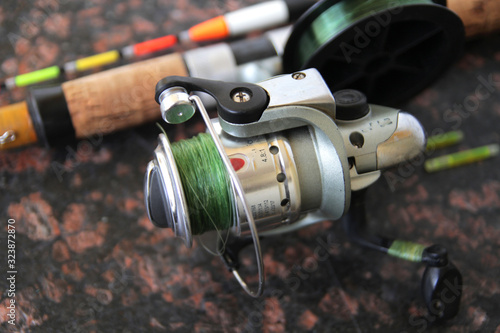  spinning with a reel with a wobbler and a float. Preparing for spring fishing.