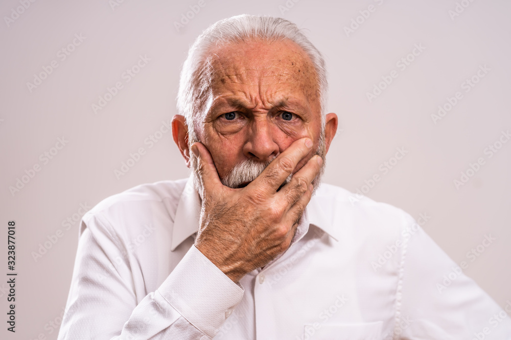 Portrait of surprised and shocked senior man. Portrait of surprised and shocked senior man.