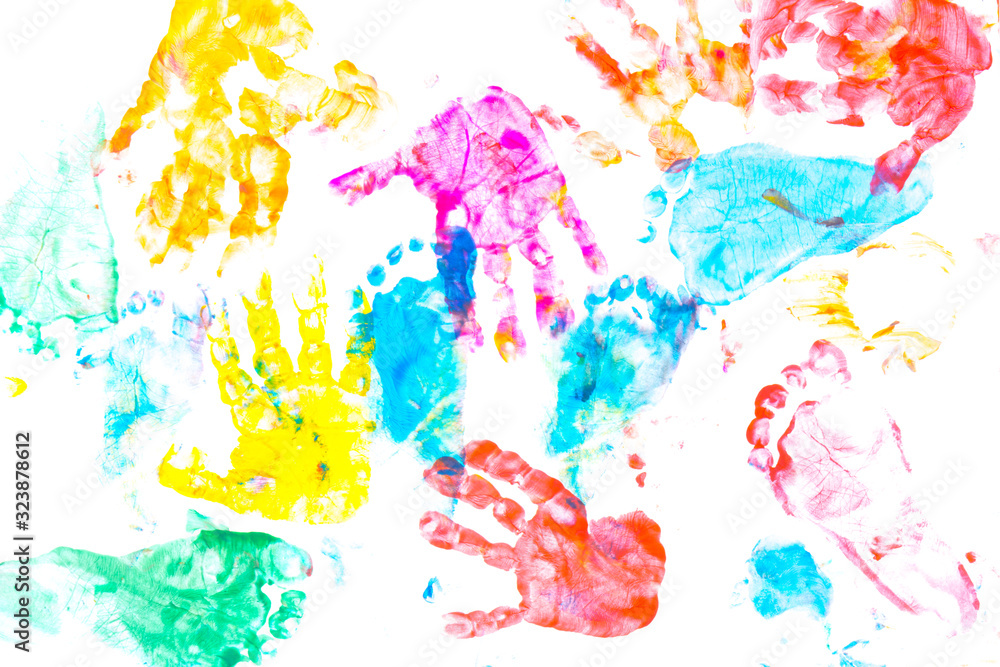 multicolored prints of children's hands and feet on white background. Abstract painted background. Children's art and painting. multicolored prints of children's hands and feet on white background. Abstract painted background. Children's art and painting.