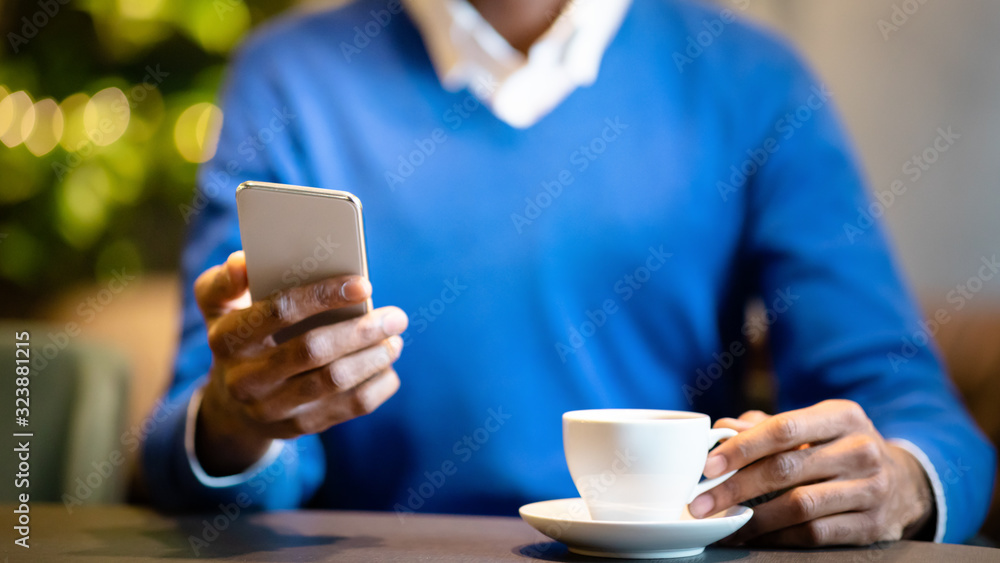 Close up of young man using his cell phone Close up of young man using his cell phone