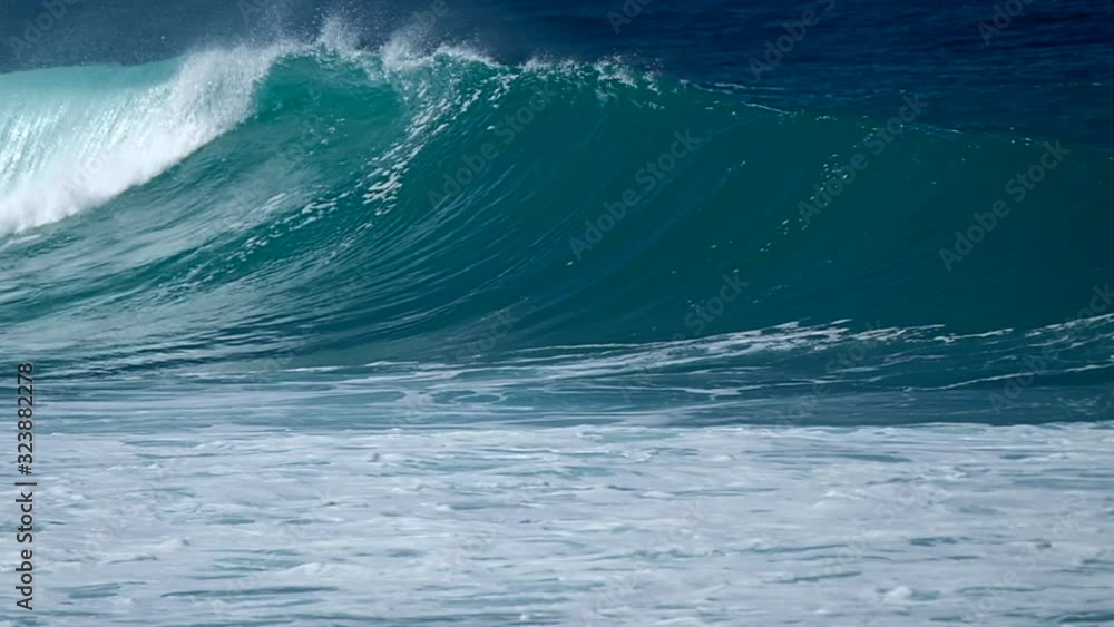 Waves break at the Banzai Pipeline surf spot on Oahu island in Hawaii Waves break at the Banzai Pipeline surf spot on Oahu island in Hawaii