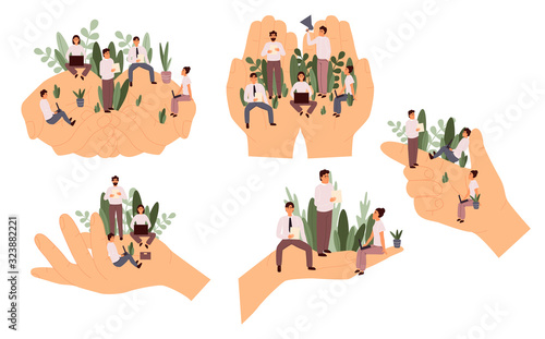 Set of giant hands holding tiny office workers