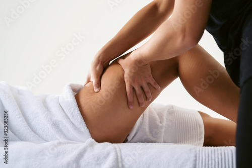 Problems of women body. Close up of anti cellulite massage for young woman in wellness center. Perfect skin fat burning beauty concept