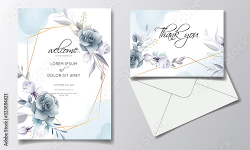 Navy blue floral wedding invitation card template with golden leaves and watercolor frame