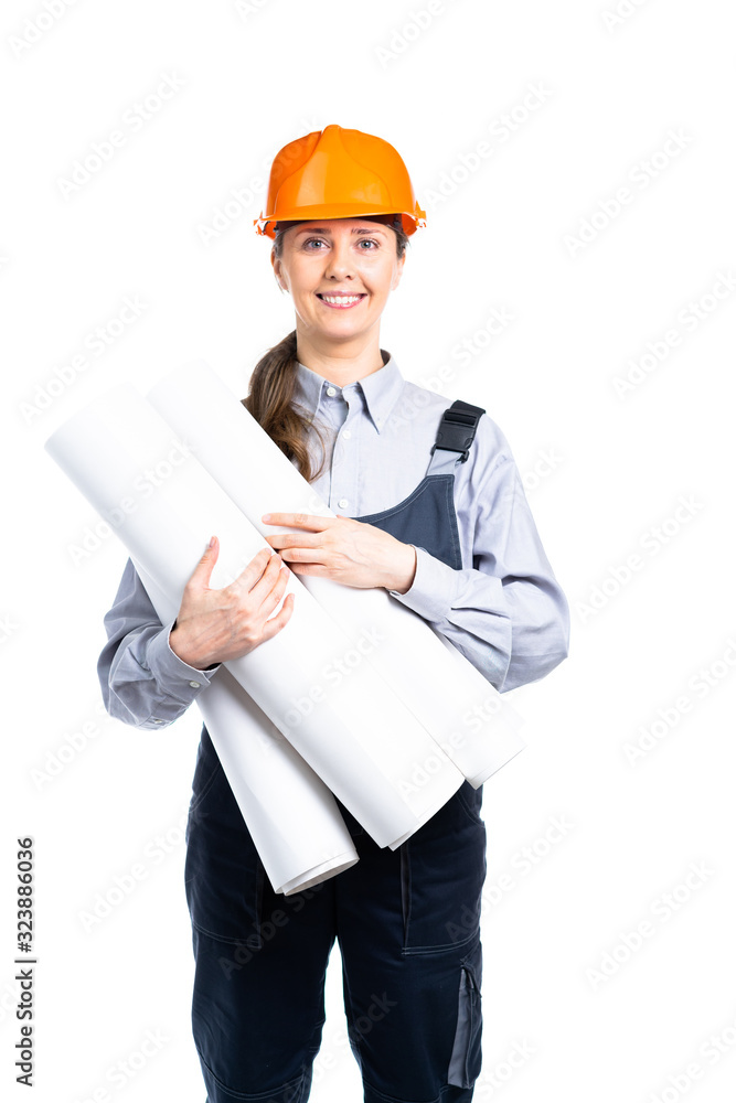 Woman builder with engineering drawings in her hands smiling. Isolated Woman builder with engineering drawings in her hands smiling. Isolated