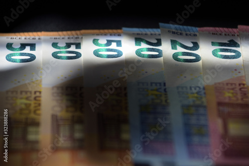 banconote euro con luci suggestive photo